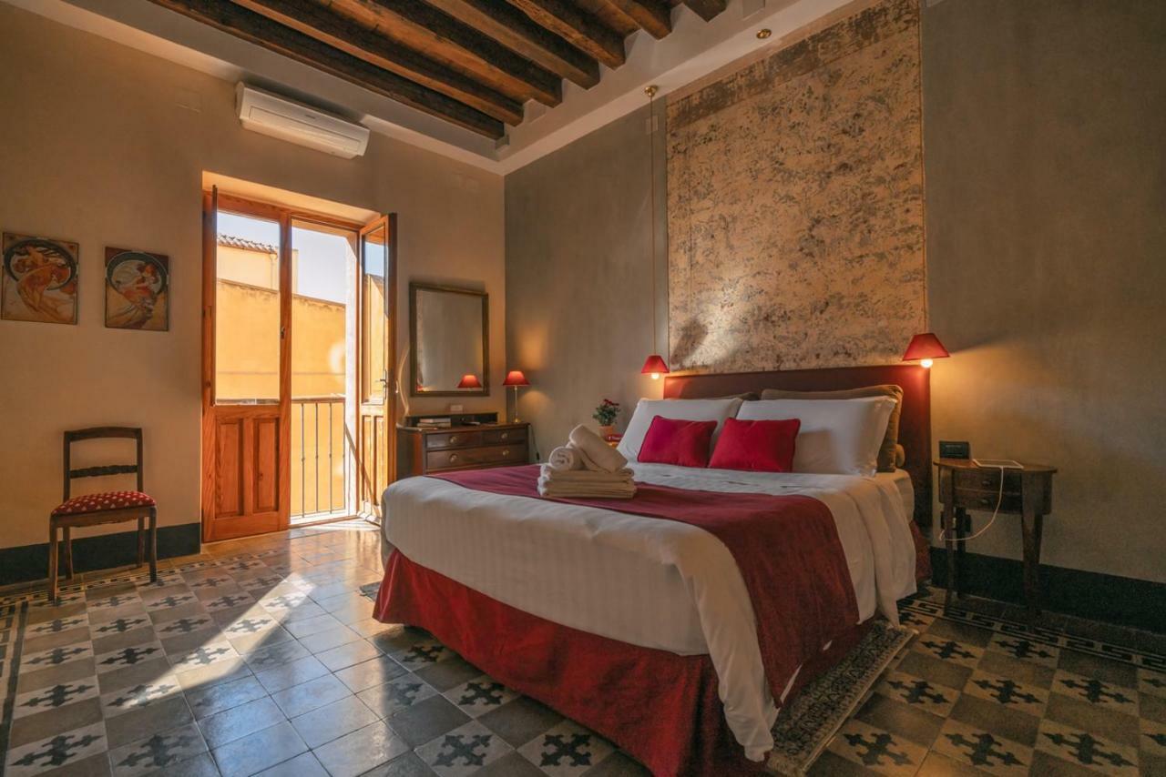 Cappuccine Guesthouse กาญารี ภายนอก รูปภาพ