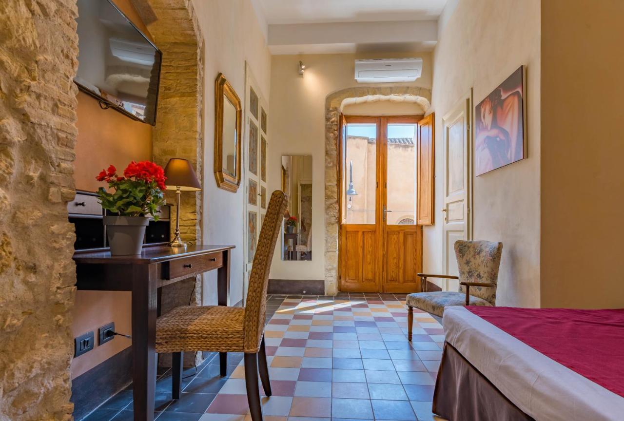 Cappuccine Guesthouse กาญารี ภายนอก รูปภาพ